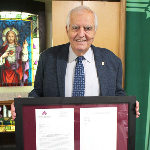 Ron Eamer with framed letter.